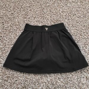 Aritzia Movetech Micro Skirt with Gold Accent